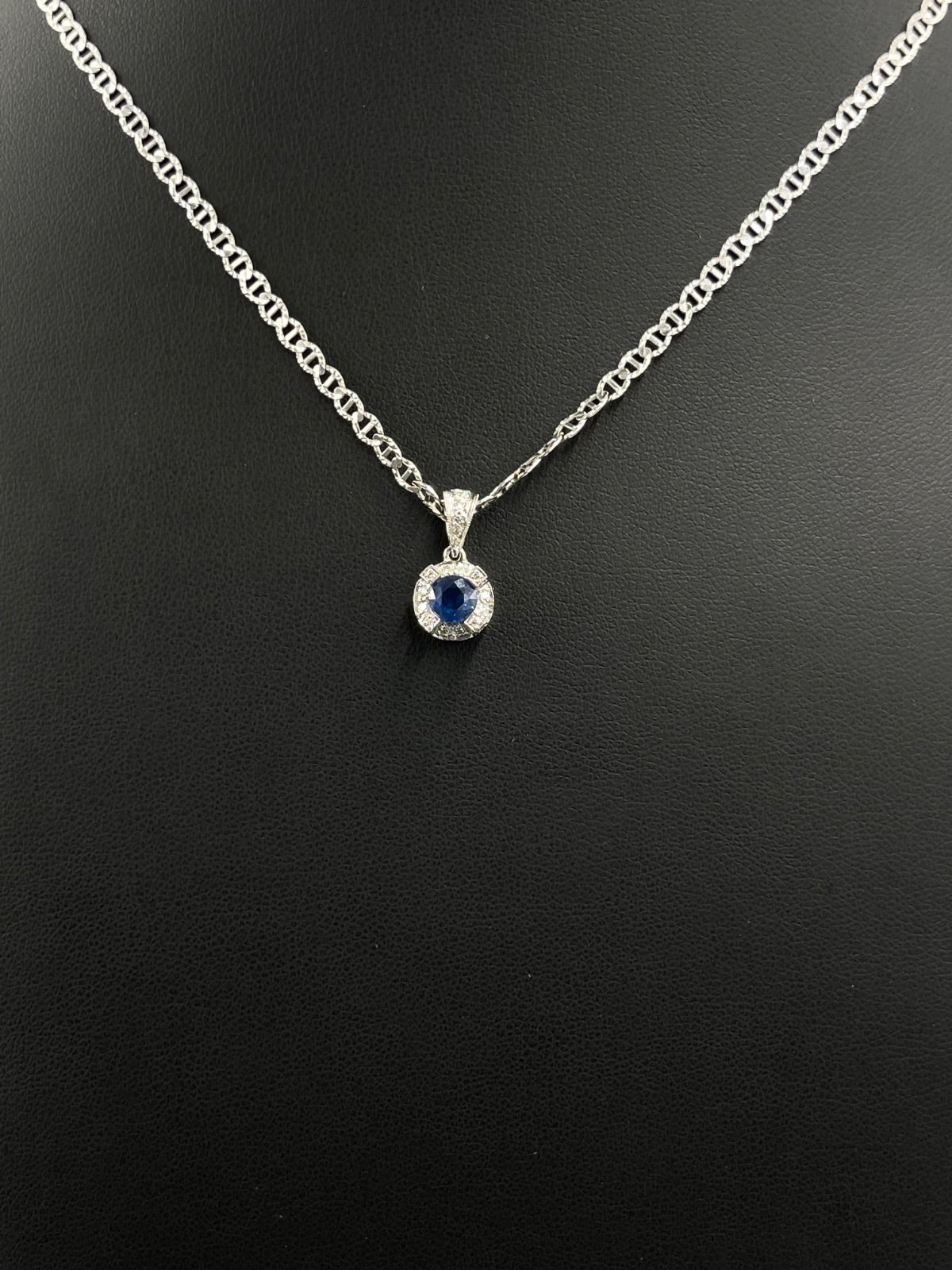 Blue Sapphire & Clear Stone Halo Pendant 2.5g — Metal Pending Verification