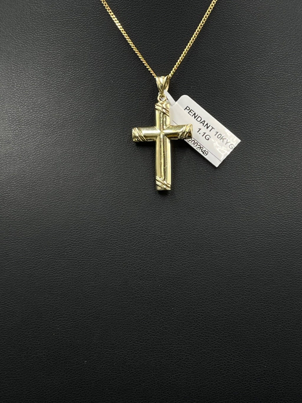 10K Gold Cross Pendant 
8.11mm