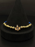 18K Gold Bracelet with Blue Charm Adjustable