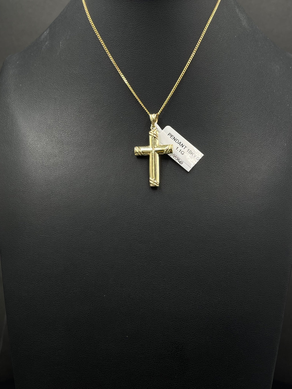 10K Gold Cross Pendant 
8.11mm
