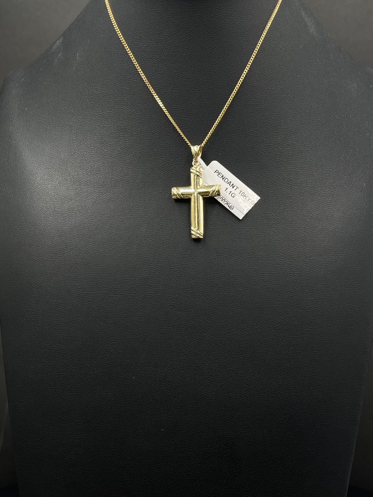 10K Gold Cross Pendant 
8.11mm