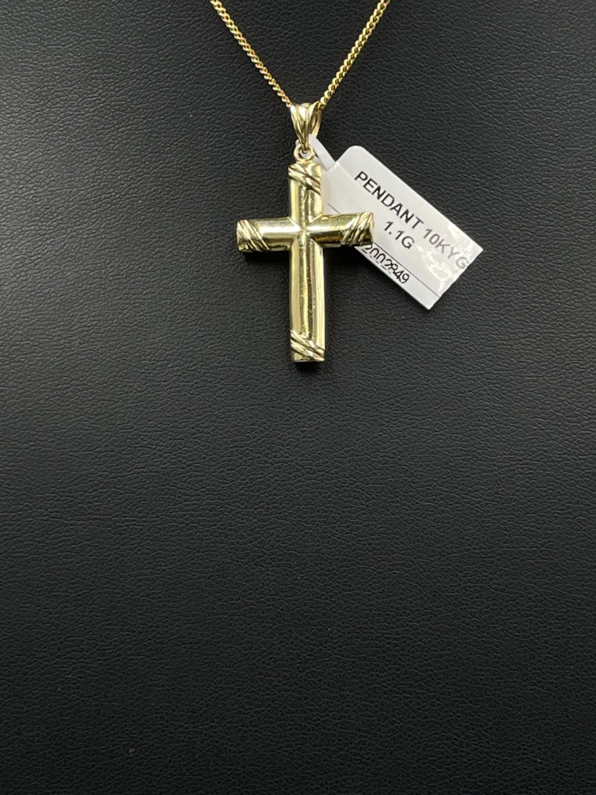 10K Gold Cross Pendant 
8.11mm